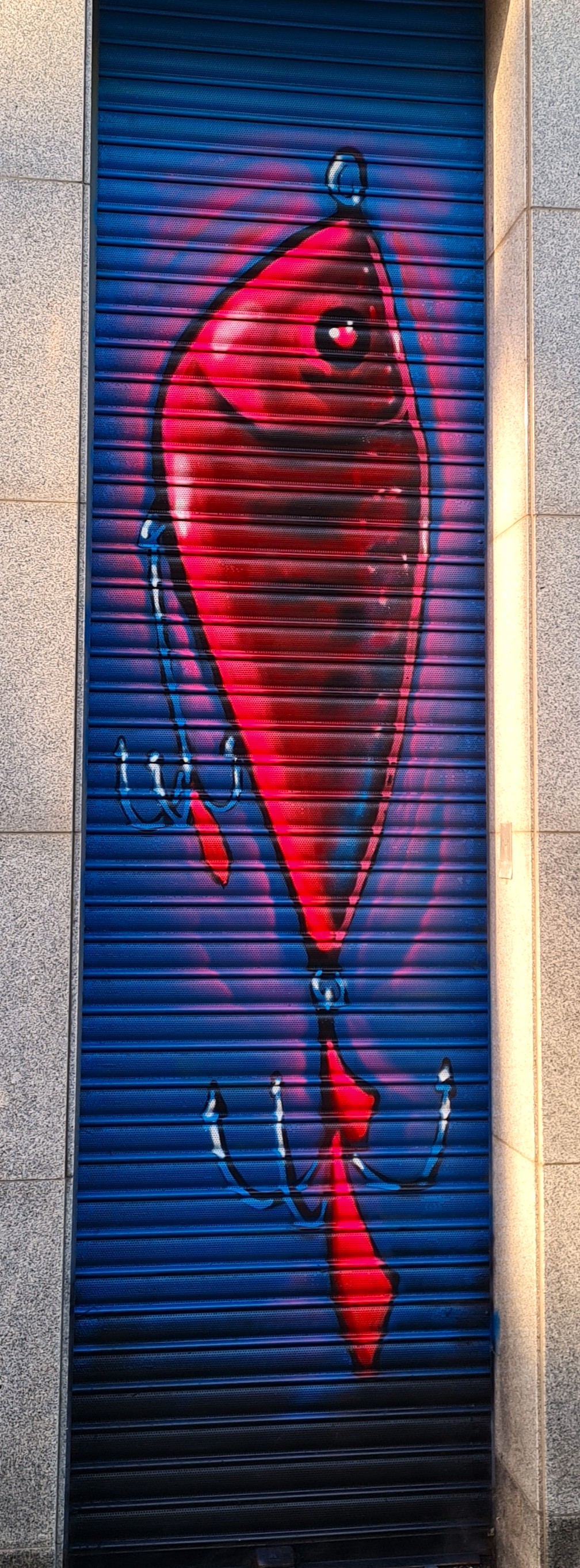 Complete storefront mural transformation for a Dublin fishing shop painted by ZAP Art mural artist Marcin Zapedowski