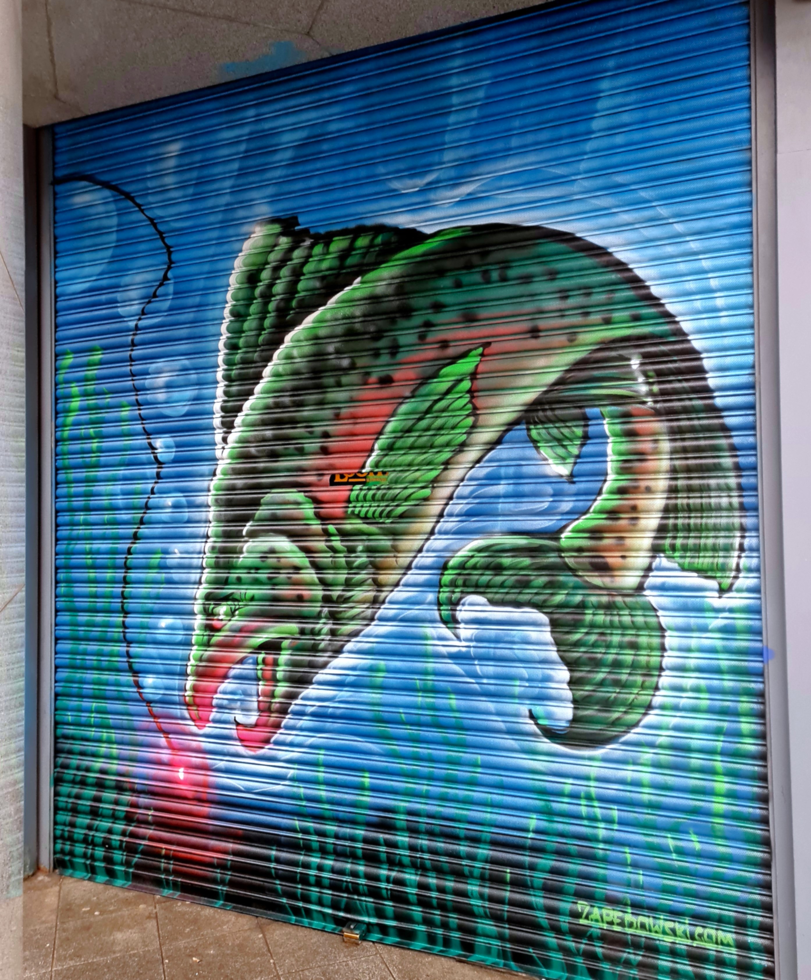 Professional outdoor mural depicting fishing scenes painted on a Dublin business by ZAP Art